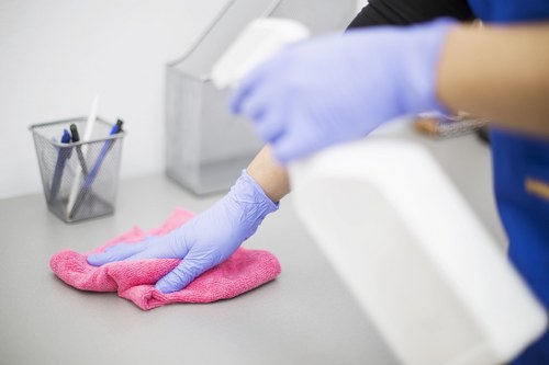 Professional cleaner preparing a tidy home in Uxbridge