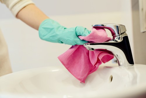 Cleaner Uxbridge staff carrying out a safe cleaning task