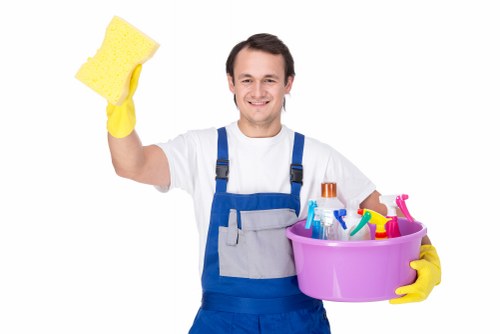 Cleaner preparing a fresh and tidy workspace in Uxbridge