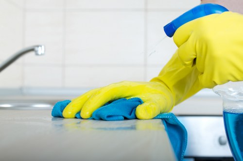 Professional cleaners maintaining a retail or office entrance in Uxbridge