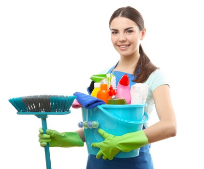 Cleaner wearing PPE while working carefully